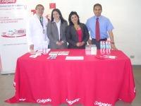 Dr. Luis Godoy, Dir. Clínica Odontológica; Alejandra Pastén, Colgate y Marcela Silva, Detailer Relaciones Profesionales, y Víctor Rodríguez, coordinador de la actividad en la Facultad de Odontología.