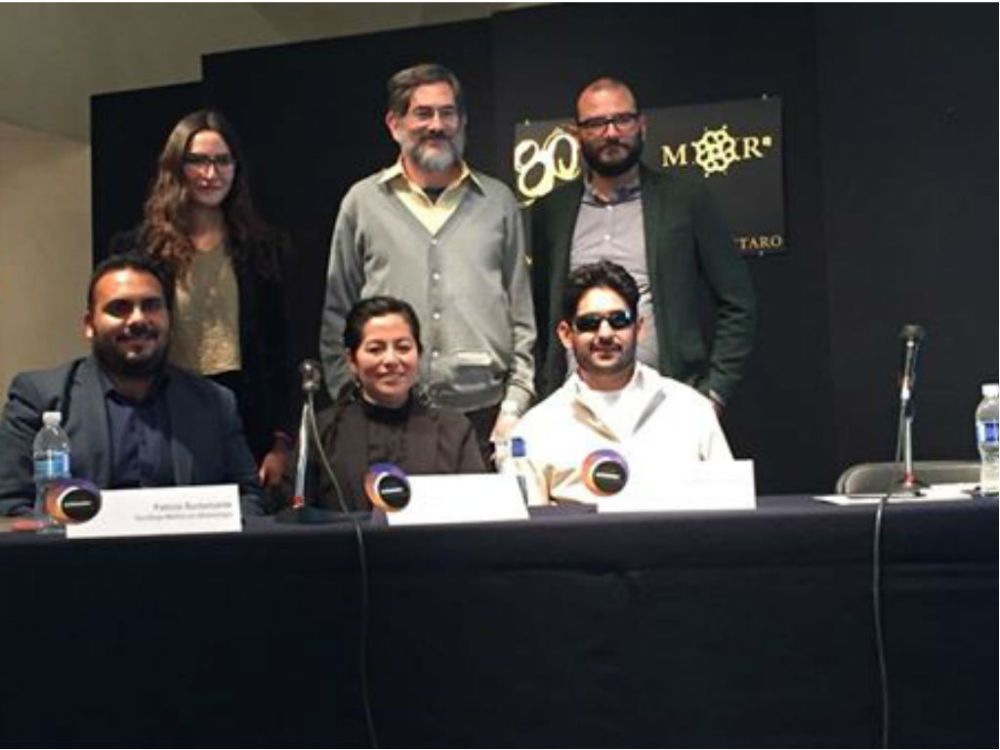El profesor Patricio Bustamante junto a los ponentes del coloquio "El imposible aparente"