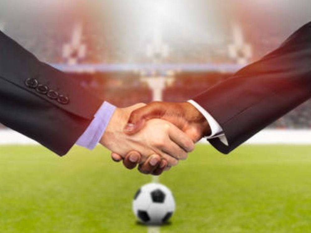 Fotografía de acuerdo deportivos