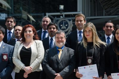 Profesor Decio Mettifogo Guerrero de la Universidad de Chile junto a Patricia Muñoz García, Directora de la Unidad Especializada en Delitos Sexuales y Violencia Intrafamiliar del Ministerio Público.